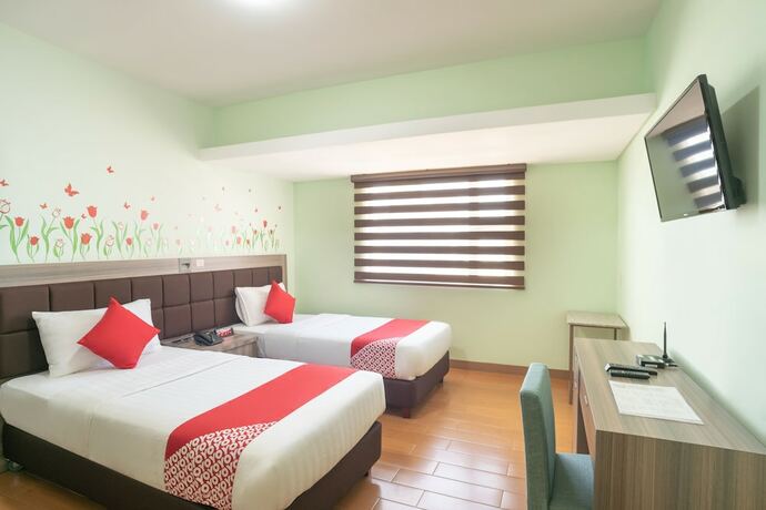 Imagen de la habitación del Hotel Oyo 196 Destiny Hotel. Foto 9