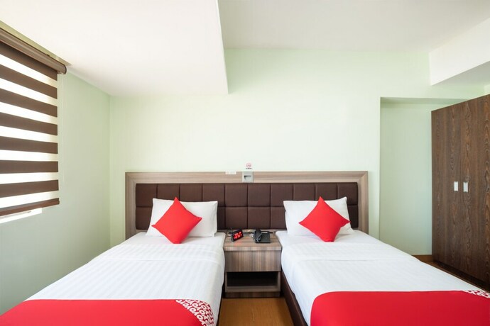 Imagen de la habitación del Hotel Oyo 196 Destiny Hotel. Foto 12