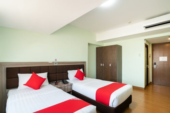 Imagen de la habitación del Hotel Oyo 196 Destiny Hotel. Foto 15