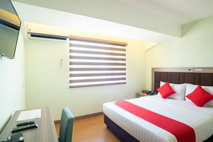Imagen de la habitación del Hotel Oyo 196 Destiny Hotel. Foto 16