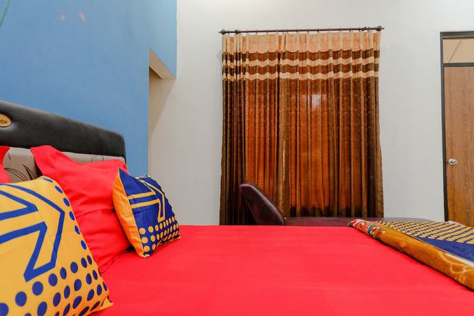 Imagen de la habitación del Hotel Oyo 1971 Dewi. Foto 4