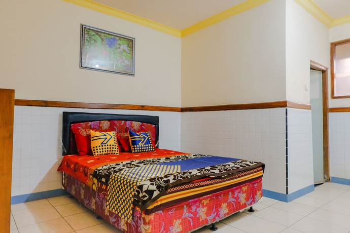 Imagen de la habitación del Hotel Oyo 1971 Dewi. Foto 5