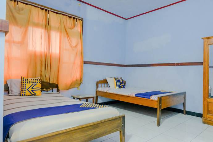 Imagen de la habitación del Hotel Oyo 1971 Dewi. Foto 6