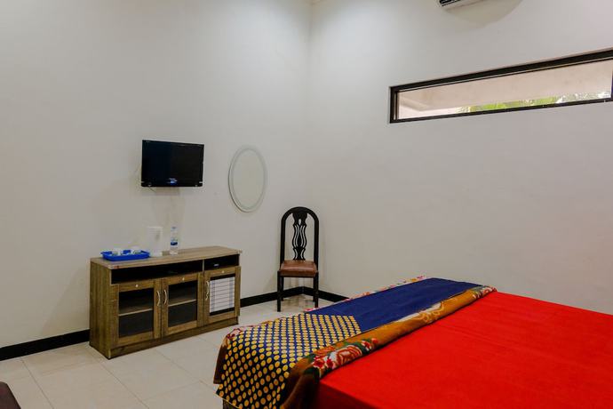 Imagen de la habitación del Hotel Oyo 1971 Dewi. Foto 8