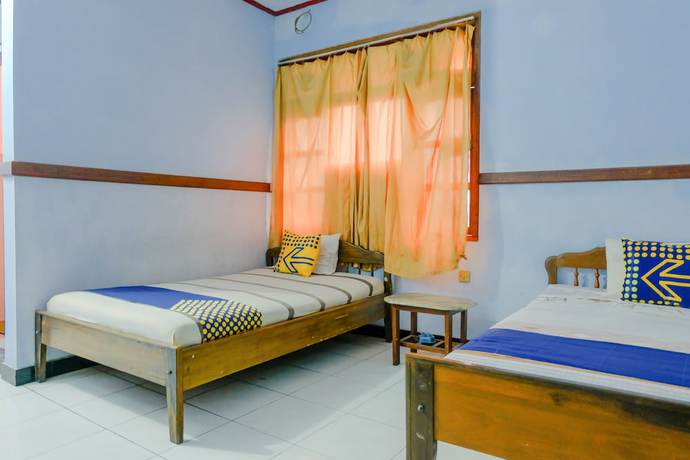 Imagen de la habitación del Hotel Oyo 1971 Dewi. Foto 9