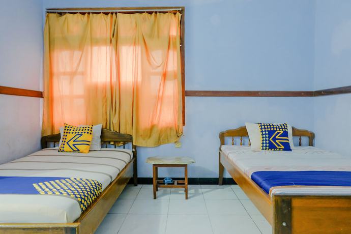 Imagen de la habitación del Hotel Oyo 1971 Dewi. Foto 12