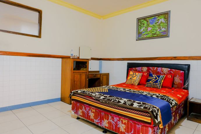 Imagen de la habitación del Hotel Oyo 1971 Dewi. Foto 13