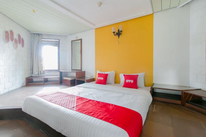 Imagen de la habitación del Hotel Oyo 1996 Koneng. Foto 13