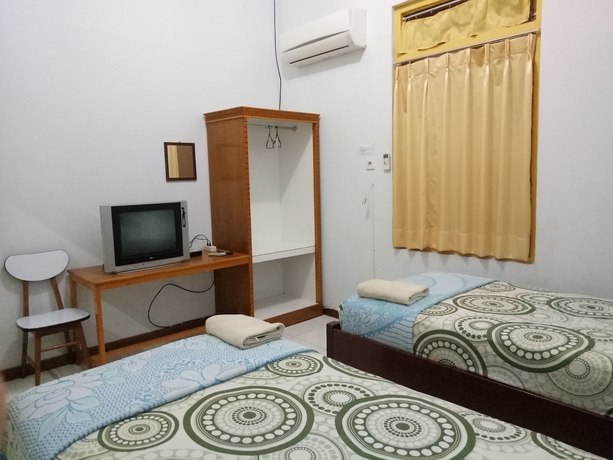 Imagen de la habitación del Hotel Oyo 2052 Mutiara Residence. Foto 10