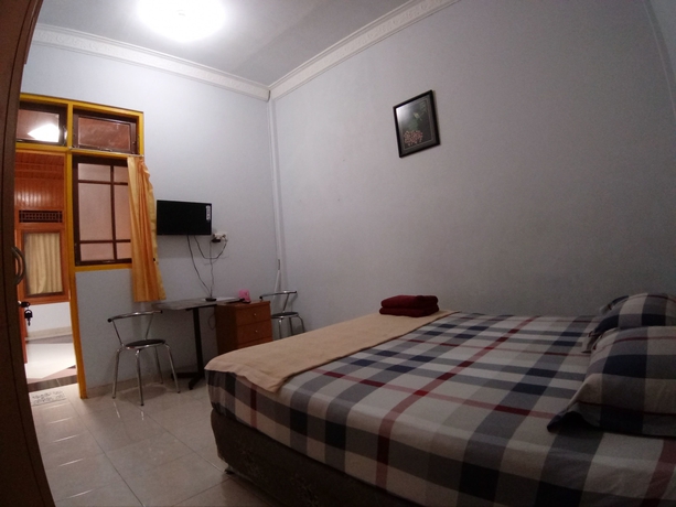 Imagen de la habitación del Hotel Oyo 2052 Mutiara Residence. Foto 11