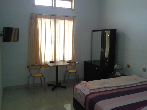Imagen de la habitación del Hotel Oyo 2052 Mutiara Residence. Foto 16