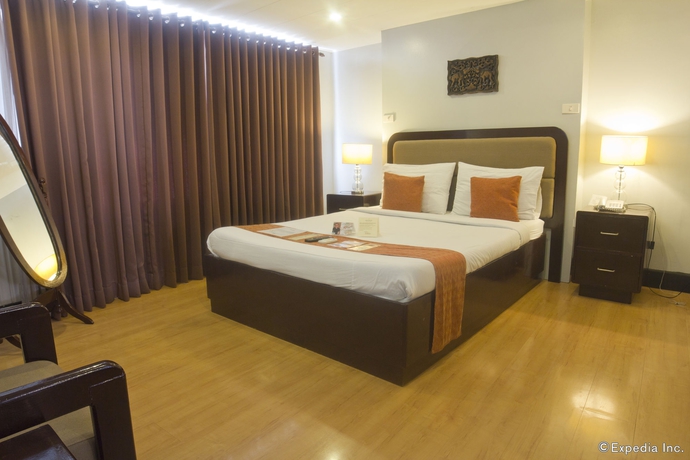 Imagen de la habitación del Hotel Oyo 209 The Oasis Paco Park. Foto 4