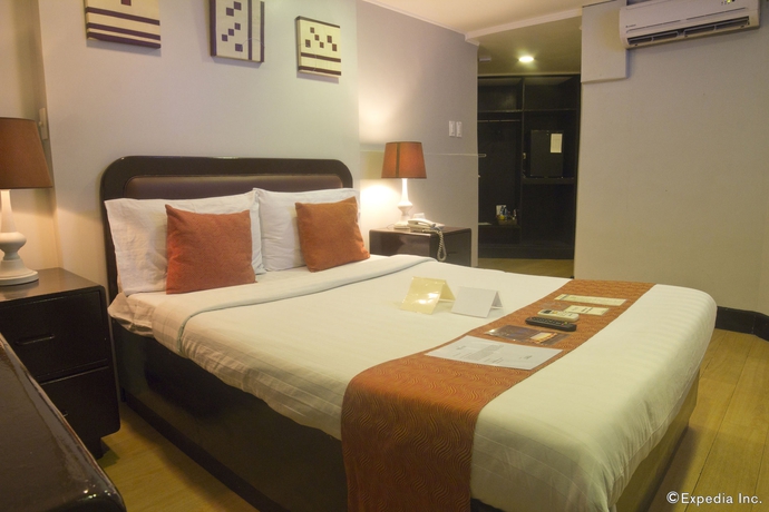 Imagen de la habitación del Hotel Oyo 209 The Oasis Paco Park. Foto 11