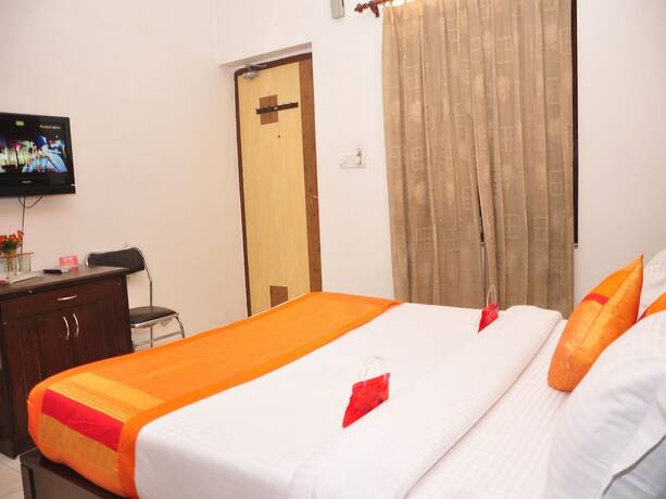 Imagen de la habitación del Hotel Oyo 2130 Hk Continental. Foto 15
