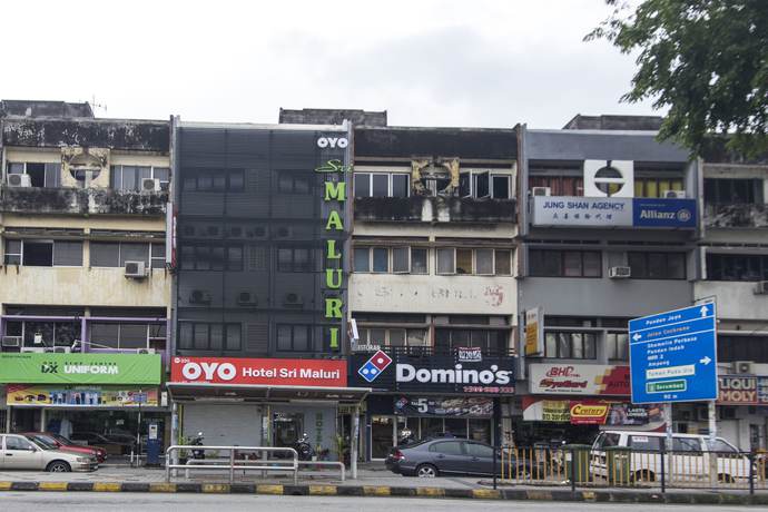Imagen de la habitación del Hotel Oyo 220 Sri Maluri. Foto 4