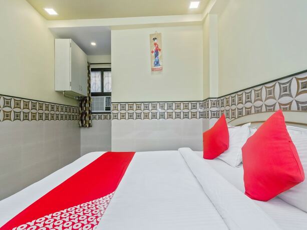 Imagen de la habitación del Hotel Oyo 22048 Trio. Foto 16