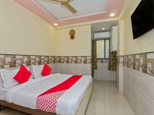 Imagen de la habitación del Hotel Oyo 22048 Trio. Foto 18