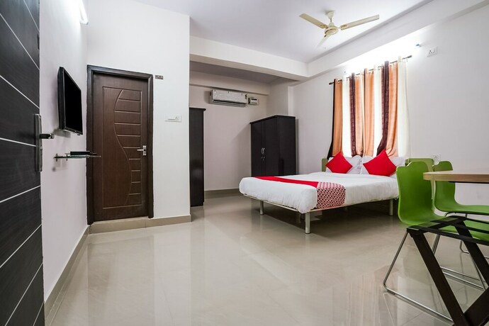 Imagen de la habitación del Hotel Oyo 22074 Siri Elite. Foto 2