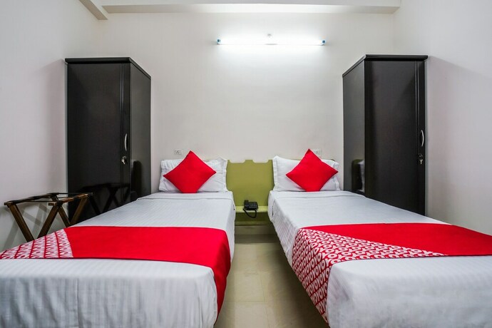 Imagen de la habitación del Hotel Oyo 22074 Siri Elite. Foto 3