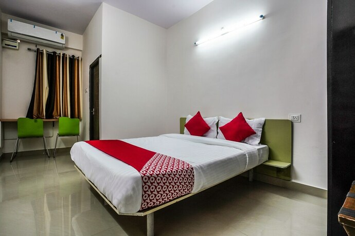 Imagen de la habitación del Hotel Oyo 22074 Siri Elite. Foto 5