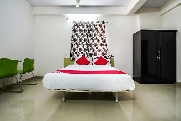 Imagen de la habitación del Hotel Oyo 22074 Siri Elite. Foto 6