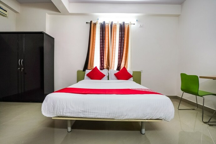 Imagen de la habitación del Hotel Oyo 22074 Siri Elite. Foto 10