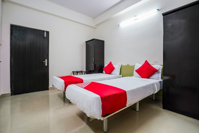 Imagen de la habitación del Hotel Oyo 22074 Siri Elite. Foto 11