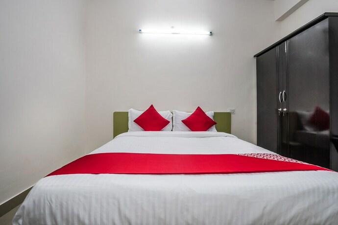 Imagen de la habitación del Hotel Oyo 22074 Siri Elite. Foto 12