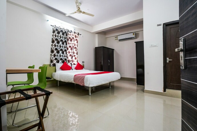 Imagen de la habitación del Hotel Oyo 22074 Siri Elite. Foto 13