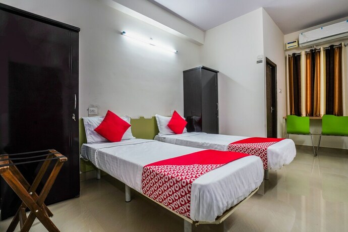 Imagen de la habitación del Hotel Oyo 22074 Siri Elite. Foto 14