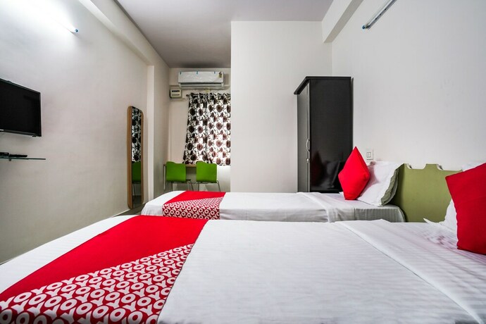 Imagen de la habitación del Hotel Oyo 22074 Siri Elite. Foto 15