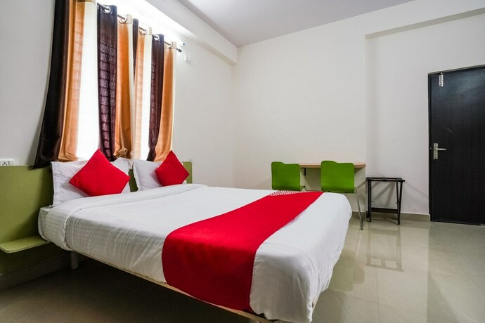 Imagen de la habitación del Hotel Oyo 22074 Siri Elite. Foto 16