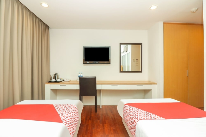 Imagen de la habitación del Hotel Oyo 225 Premier Place. Foto 6