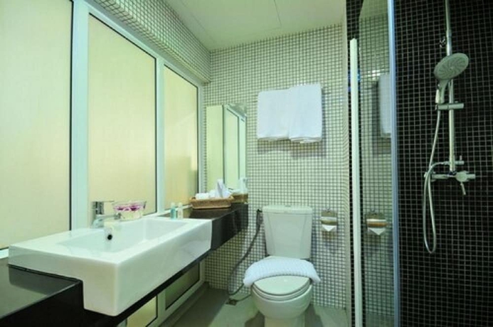 Imagen de la habitación del Hotel Oyo 225 Premier Place. Foto 13