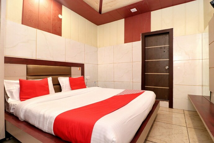 Imagen de la habitación del Hotel Oyo 22559 Mild Inn. Foto 17