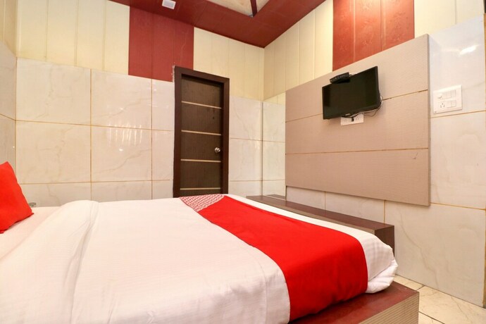 Imagen de la habitación del Hotel Oyo 22559 Mild Inn. Foto 31