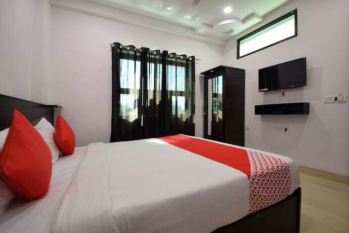 Imagen de la habitación del Hotel Oyo 23296 Quality Time. Foto 11