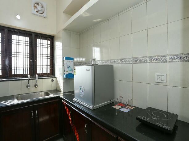 Imagen general del Hotel Oyo 23654 Home Cozy 2bhk Aluva Metro Station. Foto 12