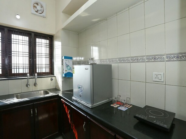 Imagen de la habitación del Hotel Oyo 23654 Home Cozy 2bhk Aluva Metro Station. Foto 21