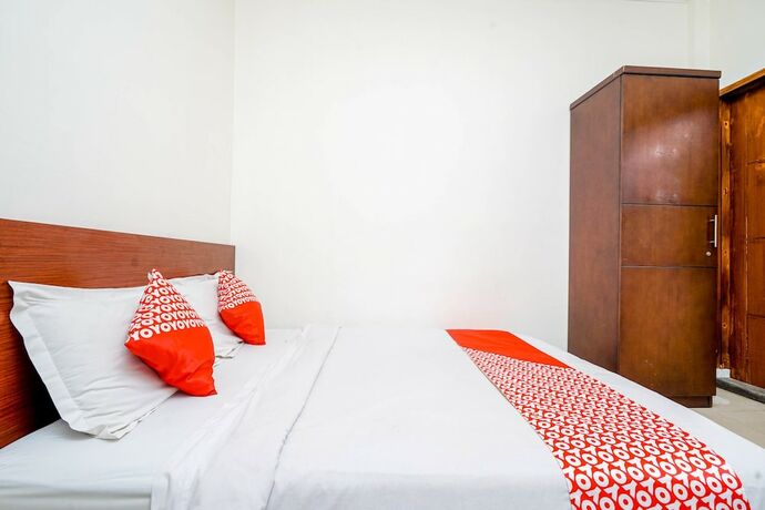 Imagen de la habitación del Hotel Oyo 2400 Maleo Exclusive Residence. Foto 20