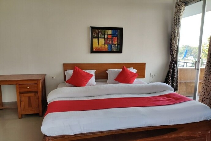 Imagen de la habitación del Hotel Oyo 2402 Highwinds. Foto 12