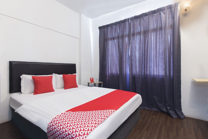 Imagen de la habitación del Hotel Oyo 251 Intime. Foto 8