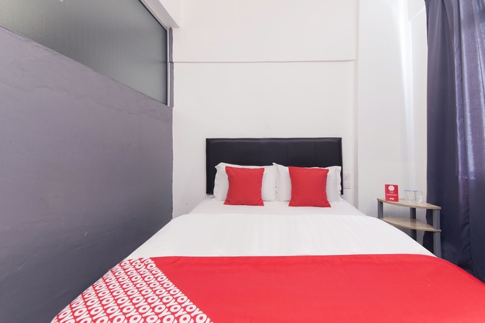 Imagen de la habitación del Hotel Oyo 251 Intime. Foto 9