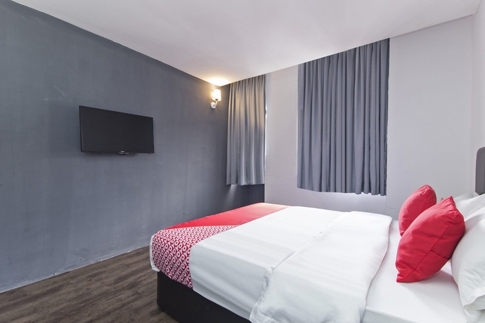 Imagen de la habitación del Hotel Oyo 251 Intime. Foto 10