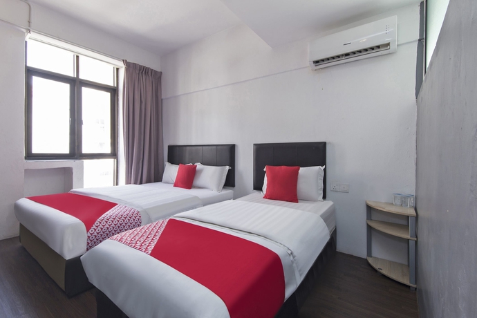 Imagen de la habitación del Hotel Oyo 251 Intime. Foto 11