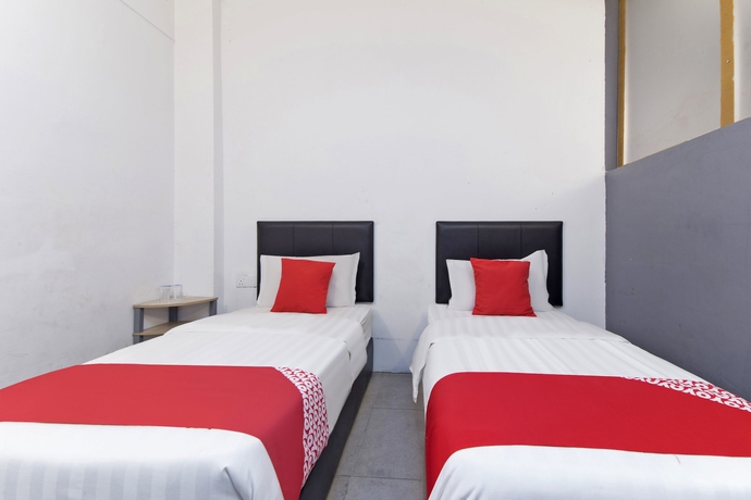 Imagen de la habitación del Hotel Oyo 251 Intime. Foto 12