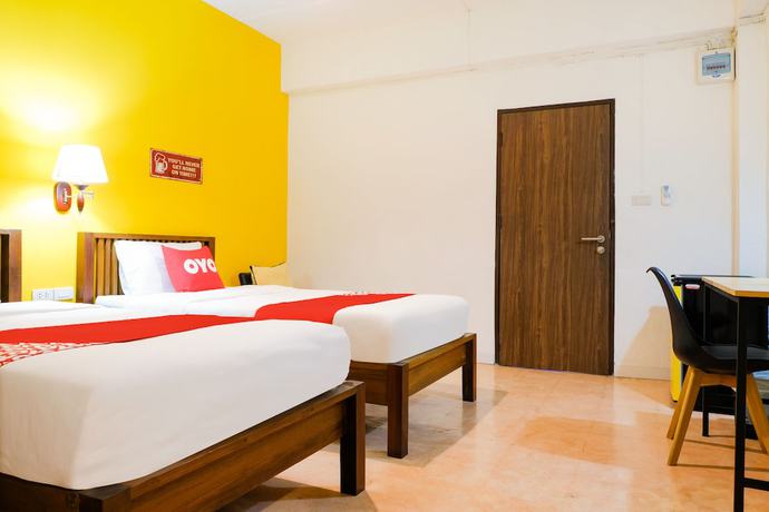 Imagen de la habitación del Hotel Oyo 252 Isleep Guesthouse. Foto 6