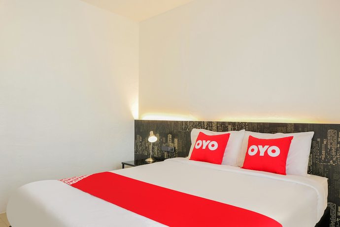 Imagen de la habitación del Hotel Oyo 252 Isleep Guesthouse. Foto 7