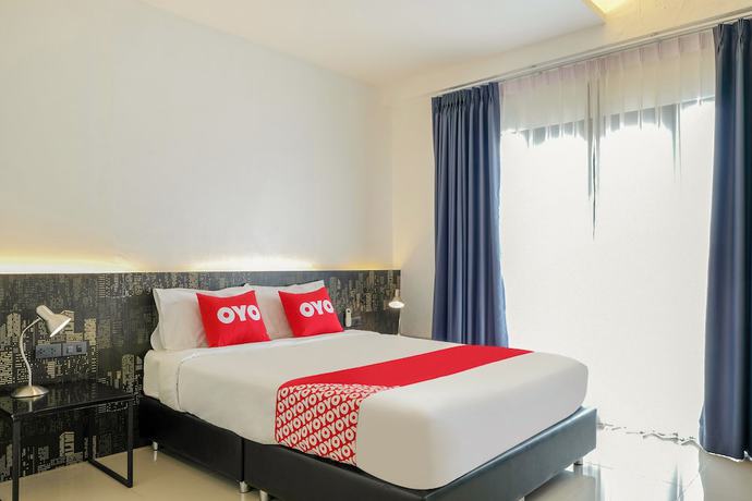 Imagen de la habitación del Hotel Oyo 252 Isleep Guesthouse. Foto 11