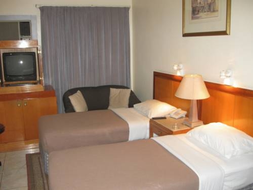 Imagen de la habitación del Hotel Oyo 270 Dream Land. Foto 13